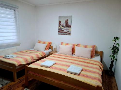 Guesthouse Jelenaにあるベッド