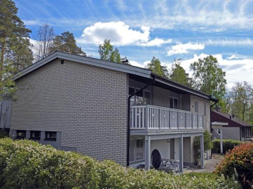 a house with a balcony on the side of it at KAL535-Virserum-Askliden-11 in Virserum