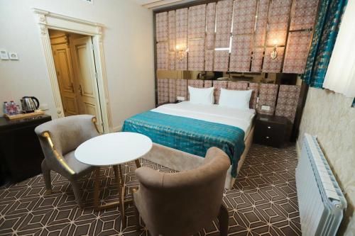 Katil atau katil-katil dalam bilik di Nerimanov Krone Hotel