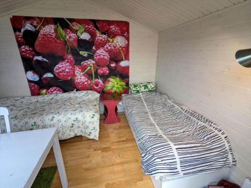 Ένα ή περισσότερα κρεβάτια σε δωμάτιο στο VGO678-Fagersanna-Sjoevaegen-45