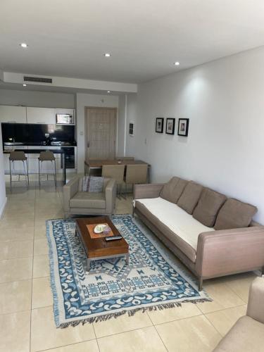 Ruang duduk di APART CONDO NORDELTA DESAYUNO INCLUIDO!! Tigre