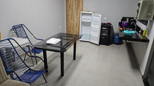 Η κουζίνα ή μικρή κουζίνα στο Moderna área com Wi-Fi e ar condicionado