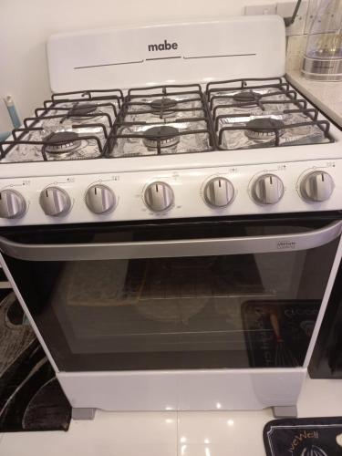 Dapur atau dapur kecil di Cozy Apartment