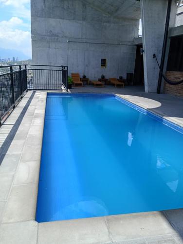 Πισίνα στο ή κοντά στο Furnished & Equipment Apt with beautiful views in MTY Downtown