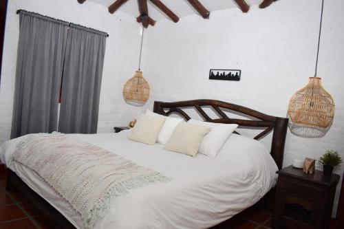 Una cama o camas en una habitación de Beautiful House in the Mountains