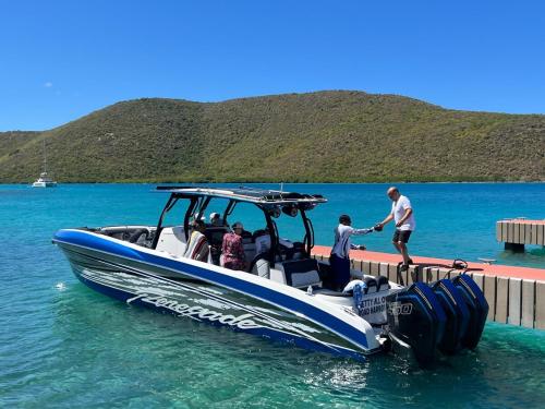 a group of people on a boat in the water at Villa Modere' in Tortola Island