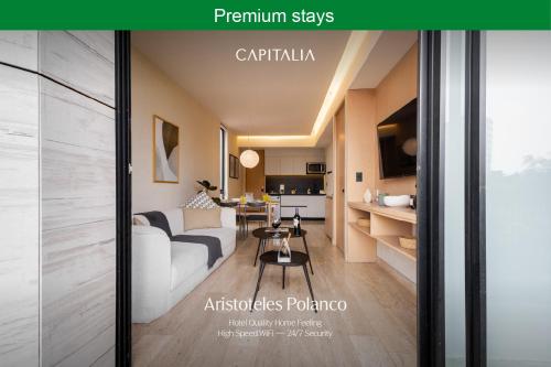 a living room with a couch and a table at Capitalia Aristoteles Polanco in Mexico City