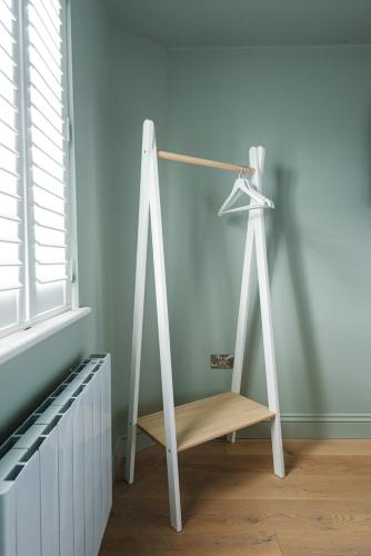 a wooden shelf in a room next to a window at Central Whitchurch - Lowcross House Guest Bedroom 5 in Whitchurch