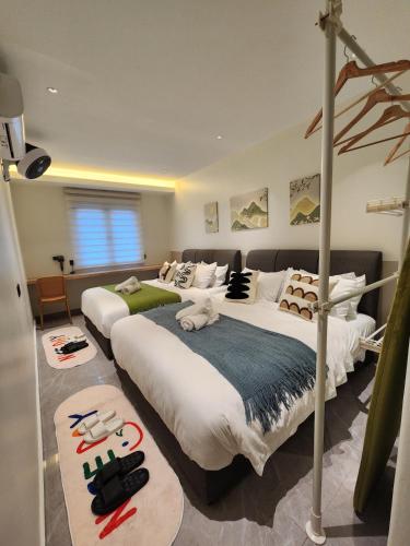 Cama o camas de una habitación en The Seven Room Near Tebrau and Mount Austin