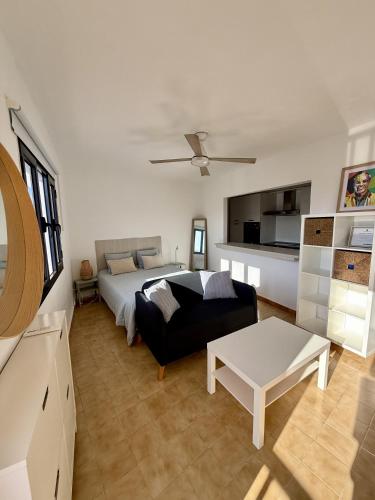 Postel nebo postele na pokoji v ubytování Estudio la santa azul