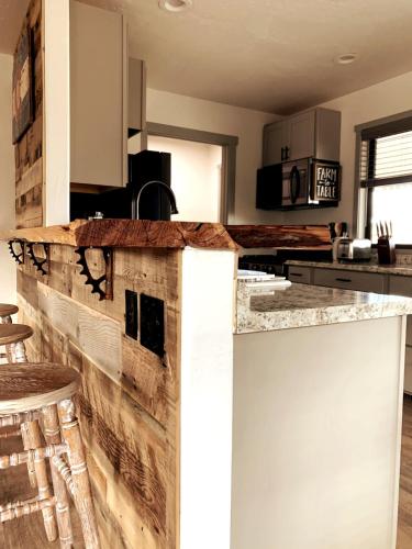 a kitchen with a wooden counter top in a room at Mulberry House in Fruita