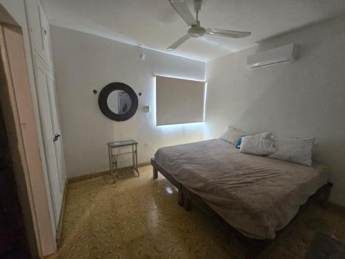 Cama o camas de una habitación en Hotel la Caprichozza