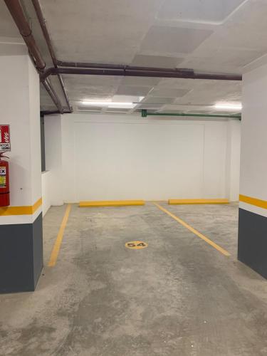an empty parking garage with a number on the floor at Apartment in Equipetrol in Santa Cruz de la Sierra