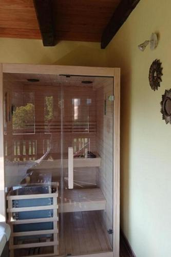 a glass door in a room with a sink at Apartments with parking space Trsce, Gorski kotar - 24880 in Tršće