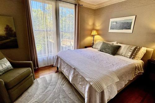 Ένα ή περισσότερα κρεβάτια σε δωμάτιο στο Lotus Suite