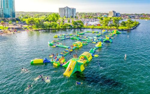 an aerial view of an amusement park in the water at Charming Autumn Getaway Sleeps 6 Mins to Lake in Barrie