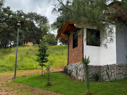Κήπος έξω από το Cabaña el roble