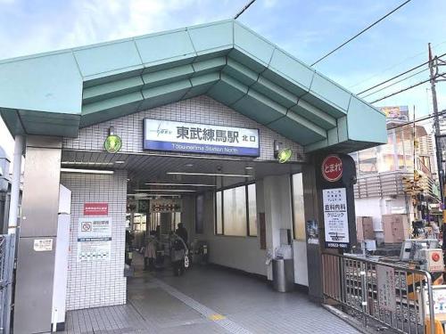 a building with a sign on top of it at Sweet house 东武练马201 in Tokyo