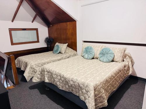 Postel nebo postele na pokoji v ubytování Monterrico Polo Apart 4 - Frente Embajada USA