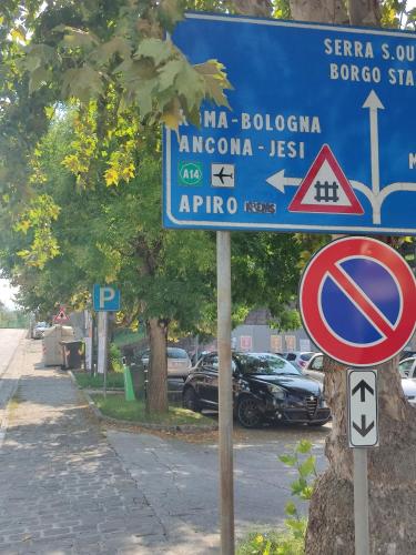 a blue street sign on the side of a street at 3 bed - Sleeps 6 - Mountain View - Parking - Pets in Gli Angeli