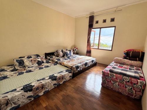 Cama o camas de una habitación en Villa Sulthon