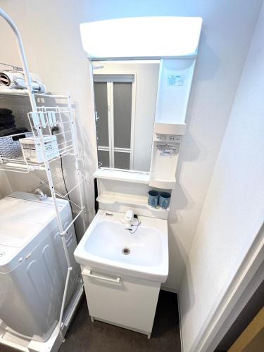 Koupelna v ubytování 池袋 巣鴨 YMhotel 最大18名可-ikebukuro sugamo-