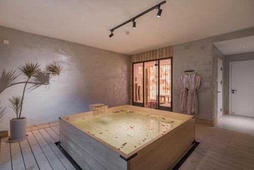 Katil atau katil-katil dalam bilik di 北京小汤一瓢私汤度假酒店 Beijing XiaoTang YiPiao Hot Spring Resort