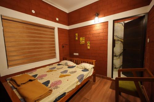 Una cama o camas en una habitación de Areca Valley Farmstay