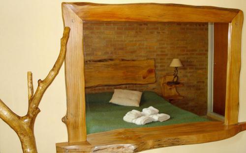 Posteľ alebo postele v izbe v ubytovaní El Chañar