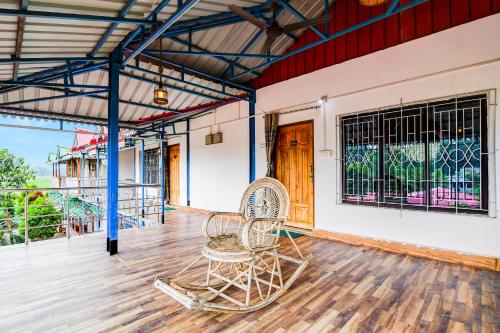 Un balcón o terraza en Hotel O Chilapata Forest Formerly Moner Manush Homestay