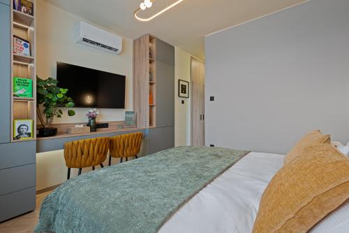 Anima Home Apartmanにあるベッド