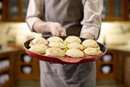 a person is holding a plate of cookies at Hyatt Place Shenzhen Dongmen in Shenzhen