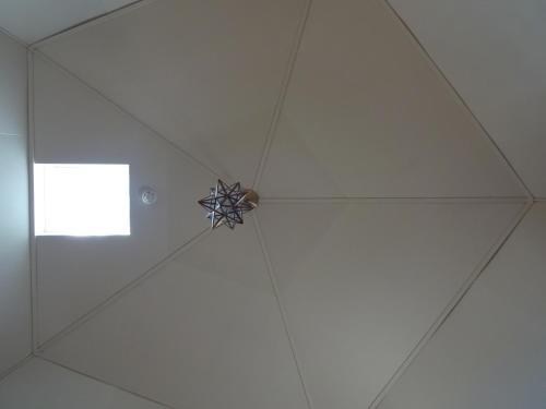 a ceiling with a star on the top of it at Twin Dome Ryugu in Hokuto