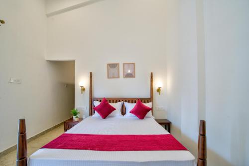 Ένα ή περισσότερα κρεβάτια σε δωμάτιο στο Tranquil 3bhk Pvt Pool Villa