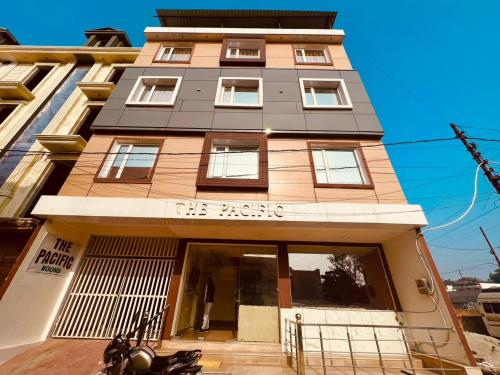 a tall building with a sign on it at Hotel Pacific Paradise, Lavish & Luxury Stay In Haridwar in Haridwār