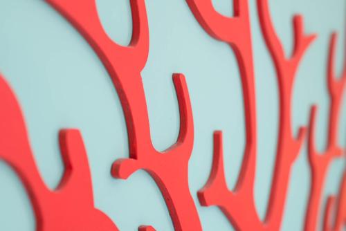 a close up of red graffiti on a wall at Sunbay Park Hotel in Civitavecchia