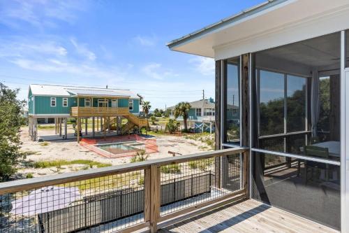 a view from the balcony of a house at Fruitcakes- Private Pool- Hot Tub- Pet Friendly in St. George Island