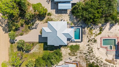 an aerial view of a house with a geometric facade at Fruitcakes- Private Pool- Hot Tub- Pet Friendly in St. George Island