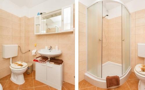 Koupelna v ubytování Apartments Mali Raj
