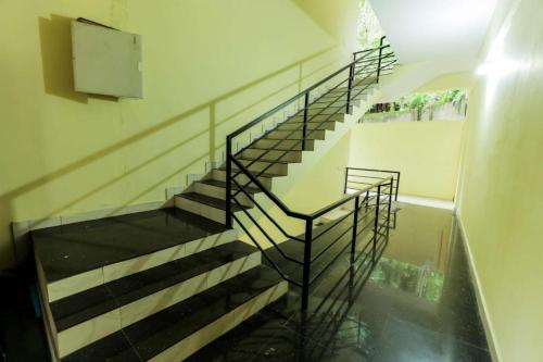 a group of stairs in a building at Igloo Residency in Vythiri