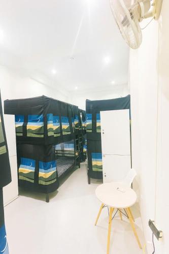 Postel nebo postele na pokoji v ubytování Hanoifriends