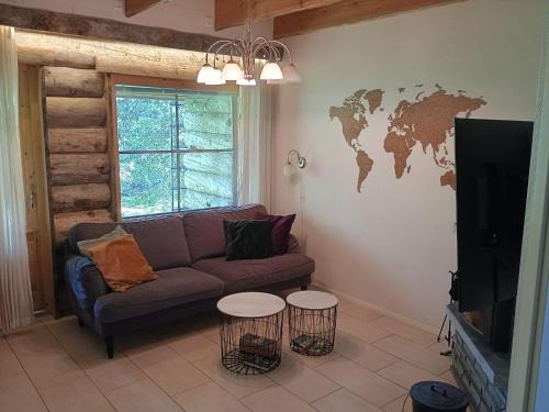 Χώρος καθιστικού στο Holiday Home Lumikieppi