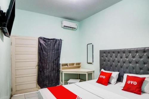 Postel nebo postele na pokoji v ubytování Hotel O Roemah Gh