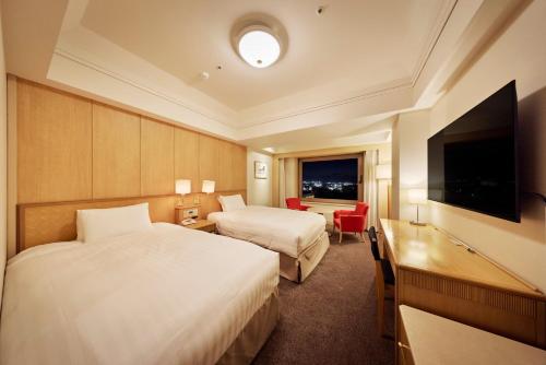 TV a/nebo společenská místnost v ubytování Hotel Nikko Northland Obihiro
