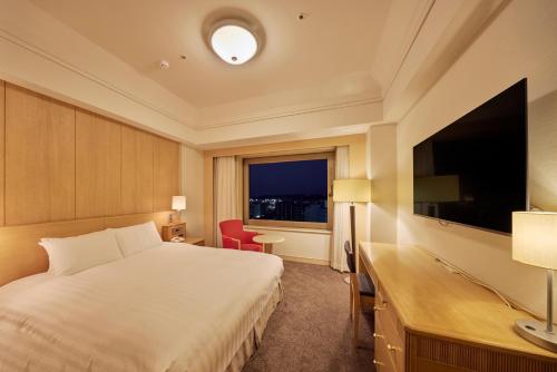 TV a/nebo společenská místnost v ubytování Hotel Nikko Northland Obihiro