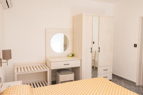 Ένα ή περισσότερα κρεβάτια σε δωμάτιο στο Residence Capri - Mont Choisy