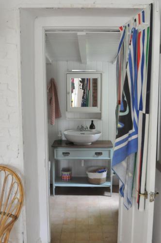 a bathroom with a sink and a mirror at Old Mill in Asturias in Llares