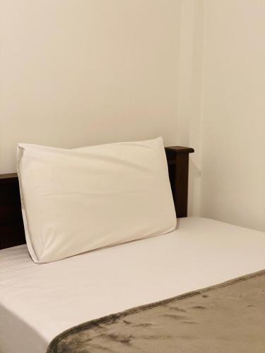 Postel nebo postele na pokoji v ubytování Raji's Luana Lounge - Galle