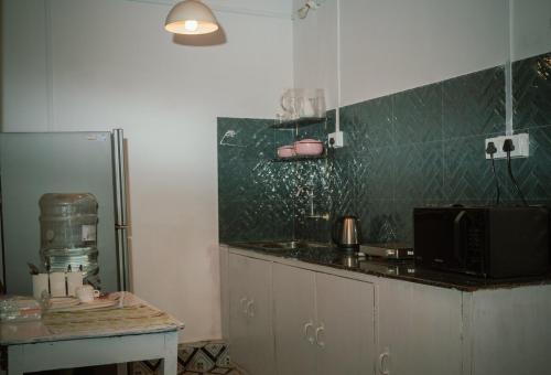 Kuchyň nebo kuchyňský kout v ubytování Cottage No 4