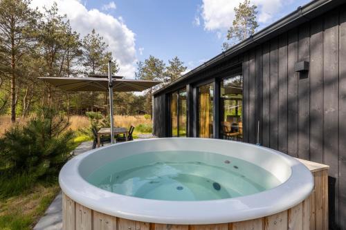 Design bungalow met wellness in parkbos